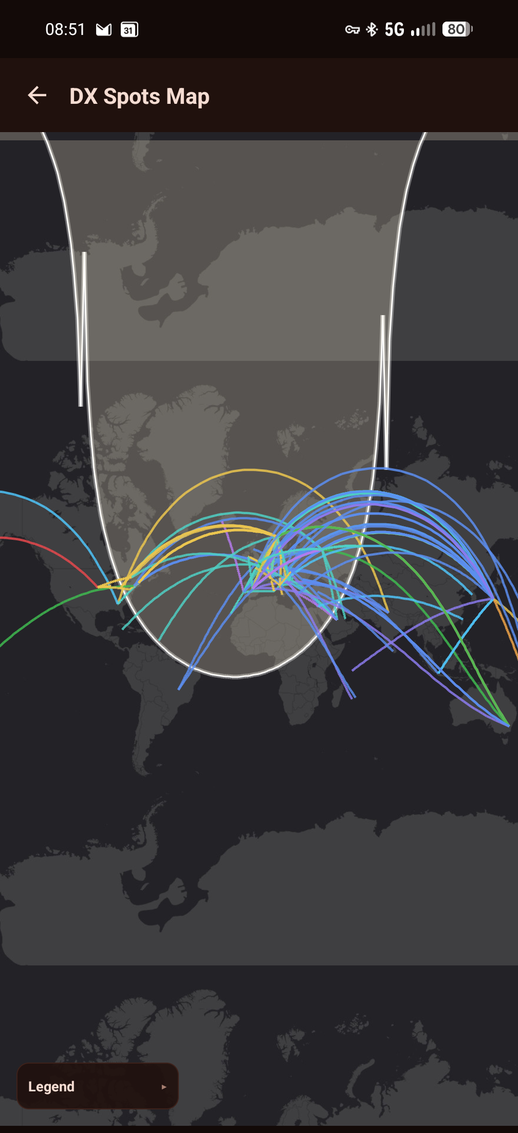 DX Spots map with color-coded great-circle lines and a day/night grayline overlay