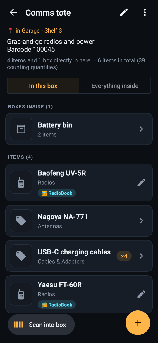 The Comms tote box: located in Garage, Shelf 3, with a Battery bin inside it and four items including two RadioBook radios